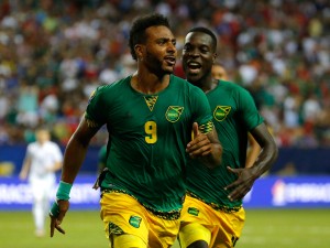 ATLANTA, GA - JULY 22:  Giles Barnes #9 of Jamaica celebrates scoring the second goal against the United States of America with Je-Vaughn Watson #15 during the 2015 CONCACAF Golf Cup Semifinal match between Jamaica and the United States at Georgia Dome on July 22, 2015 in Atlanta, Georgia.  (Photo by Kevin C. Cox/Getty Images)