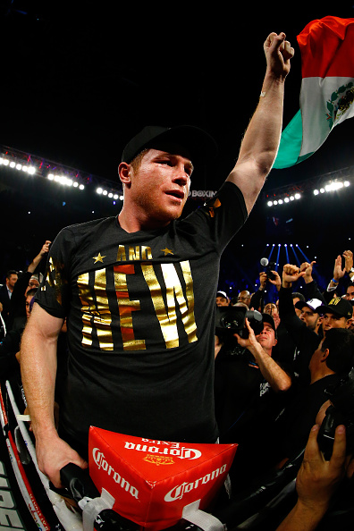 LAS VEGAS, NV - NOVEMBER 21:  Canelo Alvarez celebrates after defeating Miguel Cotto by unanimous decision in their middleweight fight at the Mandalay Bay Events Center on November 21, 2015 in Las Vegas, Nevada.  (Photo by Al Bello/Getty Images)