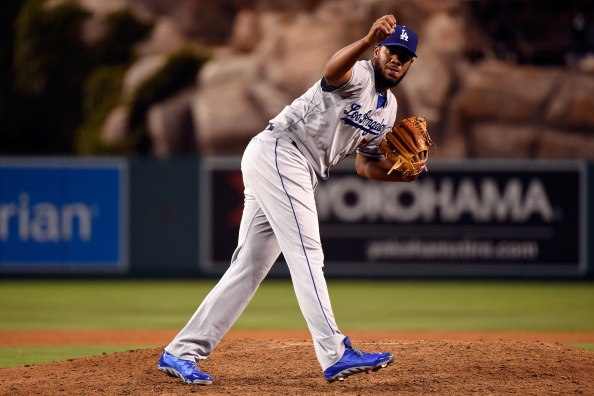 ANAHEIM, CA - AUGUST 06:  Kenley Jansen #74 of the Los Angeles Dodgers pitches in the ninth inning against the Los Angeles Angels of Anaheim at Angel Stadium of Anaheim on August 6, 2014 in Anaheim, California.  (Photo by Lisa Blumenfeld/Getty Images)
