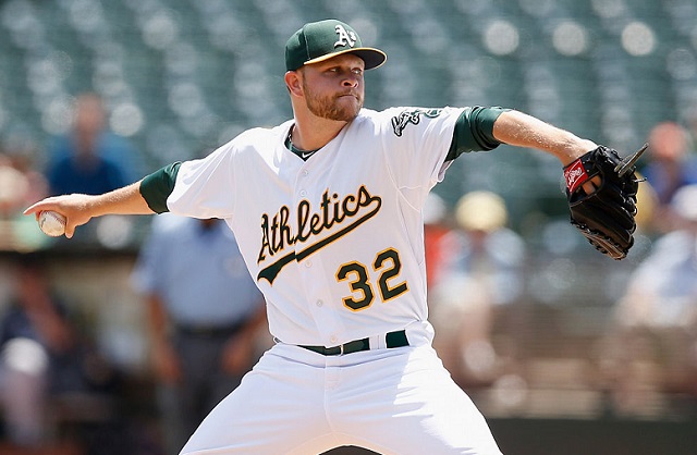 OAKLAND, CA - JULY 01: Jesse Hahn #32 of the Oakland Athletics pitches against the Colorado Rockies in the first inning at O.co Coliseum on July 1, 2015 in Oakland, California. (Photo by Ezra Shaw/Getty Images)