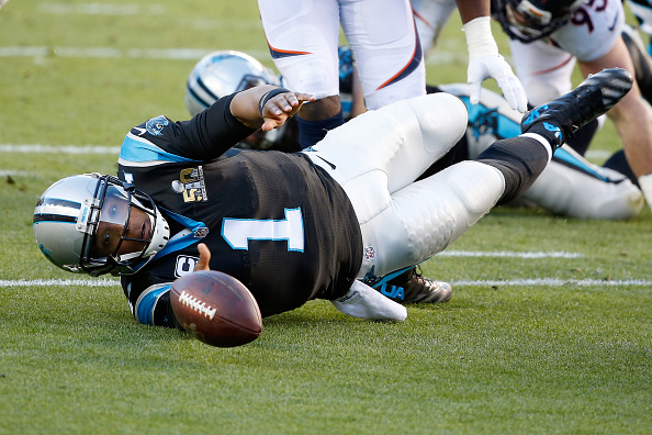 SANTA CLARA, CA - FEBRUARY 07:  Cam Newton #1 of the Carolina Panthers fumbles the ball in the first quarter of Super Bowl 50 at Levi's Stadium on February 7, 2016 in Santa Clara, California. The ball was recovered by Malik Jackson #97 of the Denver Broncos in the end zone for a touchdown. (Photo by Sean M. Haffey/Getty Images)