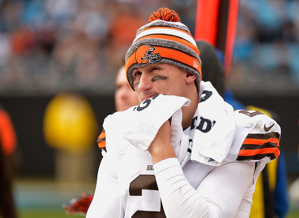 CHARLOTTE, NC - DECEMBER 21:  Johnny Manziel #2 of the Cleveland Browns watches from the bench during the second half of a loss to the Carolina Panthers at Bank of America Stadium on December 21, 2014 in Charlotte, North Carolina.  (Photo by Grant Halverson/Getty Images)