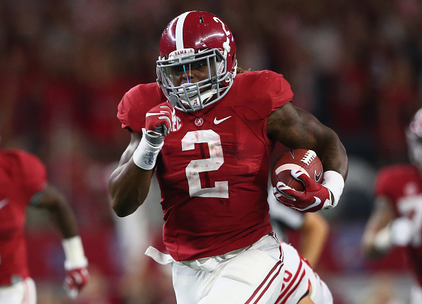 ARLINGTON, TX - SEPTEMBER 05:  Derrick Henry #2 of the Alabama Crimson Tide runs for a touchdown against the Wisconsin Badgers in the third quarter during the Advocare Classic at AT&T Stadium on September 5, 2015 in Arlington, Texas.  (Photo by Ronald Martinez/Getty Images)