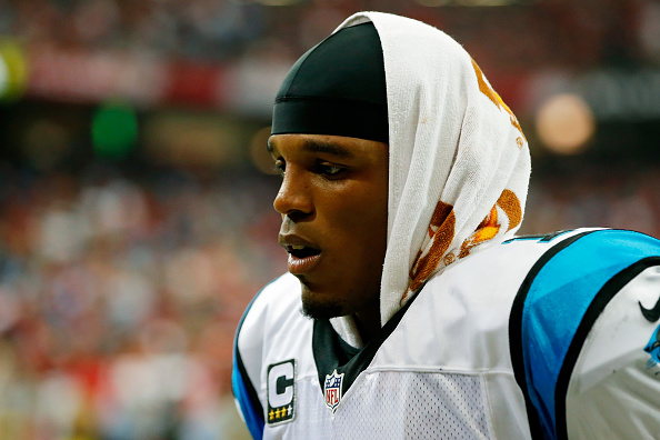 ATLANTA, GA - DECEMBER 27: Cam Newton #1 of the Carolina Panthers walks off the field at the end of the first half against the Atlanta Falcons at the Georgia Dome on December 27, 2015 in Atlanta, Georgia.  (Photo by Kevin C. Cox/Getty Images)