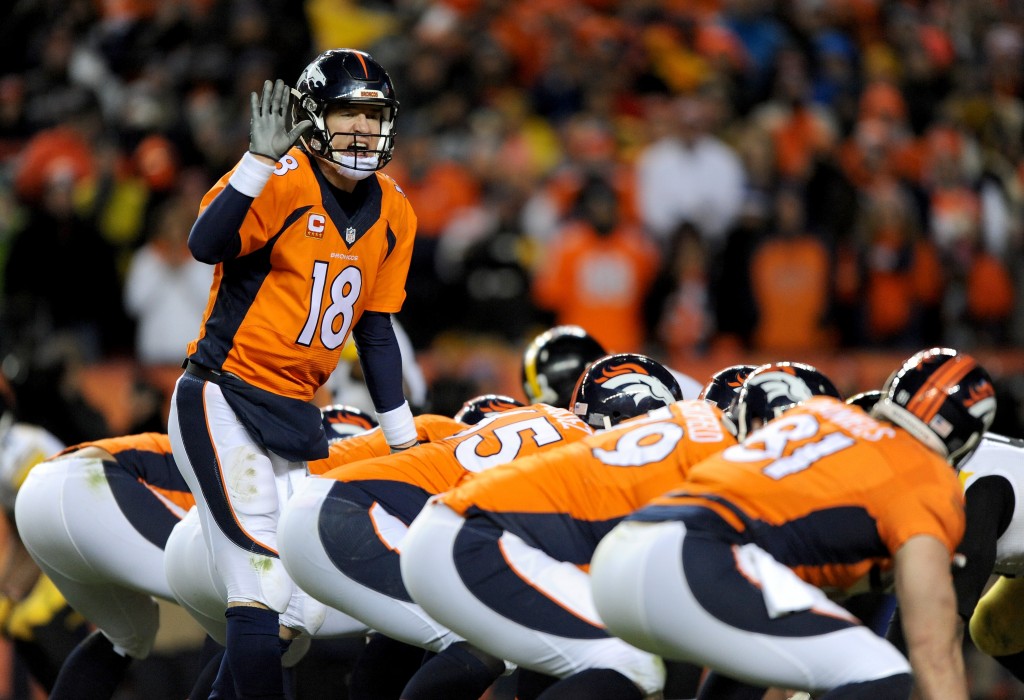DENVER, CO - JANUARY 17:  Peyton Manning #18 of the Denver Broncos calls a play against the Pittsburgh Steelers  during the AFC Divisional Playoff Game at Sports Authority Field at Mile High on January 17, 2016 in Denver, Colorado.  (Photo by Dustin Bradford/Getty Images)