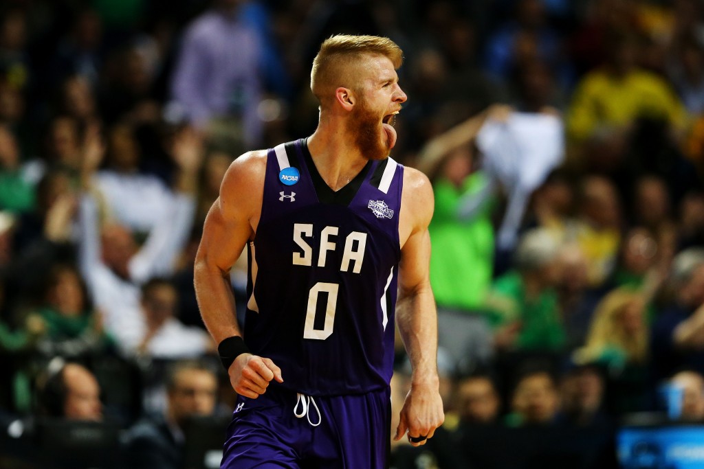 NEW YORK, NY - MARCH 18:  Thomas Walkup #0 of the Stephen F. Austin Lumberjacks reacts in the second half against the West Virginia Mountaineers during the first round of the 2016 NCAA Men's Basketball Tournament at Barclays Center on March 18, 2016 in the Brooklyn borough of New York City.  (Photo by Elsa/Getty Images)
