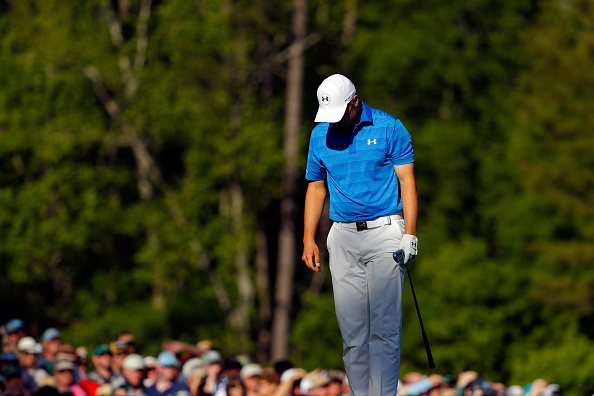 AUGUSTA, GEORGIA - APRIL 10:  Jordan Spieth of the United States reacts after hitting his tee shot into the water on the 12th hole during the final round of the 2016 Masters Tournament at Augusta National Golf Club on April 10, 2016 in Augusta, Georgia.  (Photo by Kevin C. Cox/Getty Images)