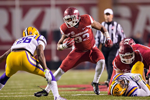 FAYETTEVILLE, AR - NOVEMBER 15:  Jonathan Williams #32 of the Arkansas Razorbacks runs the ball during the first quarter against the LSU Tigers at Razorback Stadium on November 15, 2014 in Fayetteville, Arkansas.  The Razorbacks defeated the Tigers 17-0.  (Photo by Wesley Hitt/Getty Images)