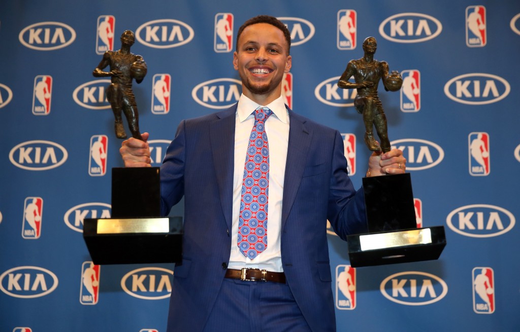 OAKLAND, CA - MAY 10:  Stephen Curry of the Golden State Warriors poses with his back-to-back NBA Most Valuable Player Awards following a press conference at ORACLE Arena on May 10, 2016 in Oakland, California. NOTE TO USER: User expressly acknowledges and agrees that, by downloading and or using this photograph, User is consenting to the terms and conditions of the Getty Images License Agreement.  (Photo by Ezra Shaw/Getty Images)