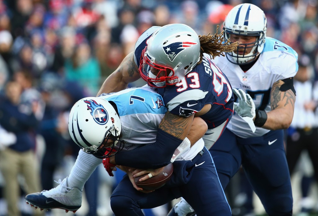 FOXBORO, MA - DECEMBER 20:  Jabaal Sheard #93 of the New England Patriots sacks Zach Mettenberger #7 of the Tennessee Titans during the first half at Gillette Stadium on December 20, 2015 in Foxboro, Massachusetts.  (Photo by Maddie Meyer/Getty Images)