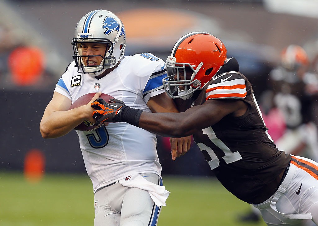 CLEVELAND, OH - OCTOBER 13:  Quarterback Matthew Stafford #9 of the Detroit Lions is hit by linebacker Barkevious Mingo #51 of the Cleveland Browns at FirstEnergy Stadium on October 13, 2013 in Cleveland, Ohio.  (Photo by Matt Sullivan/Getty Images)