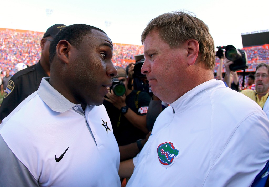 GAINESVILLE, FL - NOVEMBER 07: Head coaches Derek Mason of the Vanderbilt Commodores and Jim McElwain of the Florida Gators shake hands after the game at Ben Hill Griffin Stadium on November 7, 2015 in Gainesville, Florida.  (Photo by Rob Foldy/Getty Images)