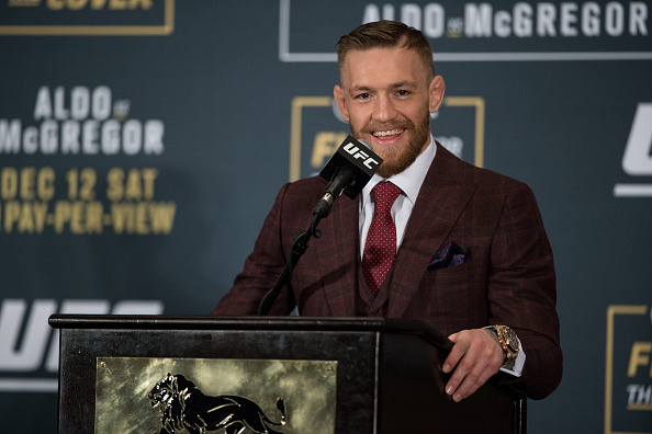 LAS VEGAS, NV - DECEMBER 12:  UFC featherweight champion Conor McGregor speaks to the media at the post fight press conference after his 13 second knockout victory over Jose Aldo in their featherweight championship fight during the UFC 194 event inside MGM Grand Garden Arena on December 12, 2015 in Las Vegas, Nevada.  (Photo by Brandon Magnus/Zuffa LLC/Zuffa LLC via Getty Images)