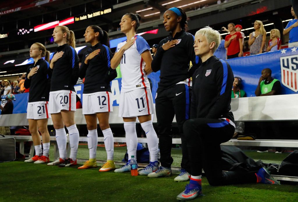 ATLANTA, GA - SEPTEMBER 18:  Megan Rapinoe #15 kneels during the National Anthem prior to the match between the United States and the Netherlands at Georgia Dome on September 18, 2016 in Atlanta, Georgia.  (Photo by Kevin C. Cox/Getty Images)