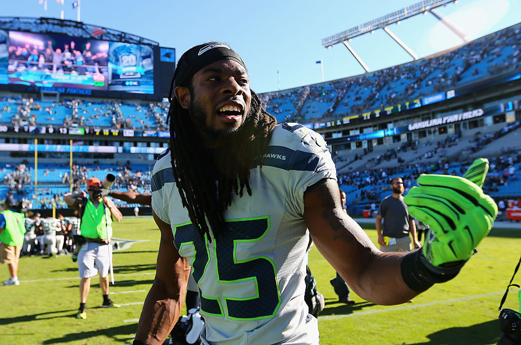 CHARLOTTE, NC - OCTOBER 26:  Richard Sherman #25 of the Seattle Seahawks leaves the field after a 13-9 victory over the Carolina Panthers  at Bank of America Stadium on October 26, 2014 in Charlotte, North Carolina.  (Photo by Streeter Lecka/Getty Images)