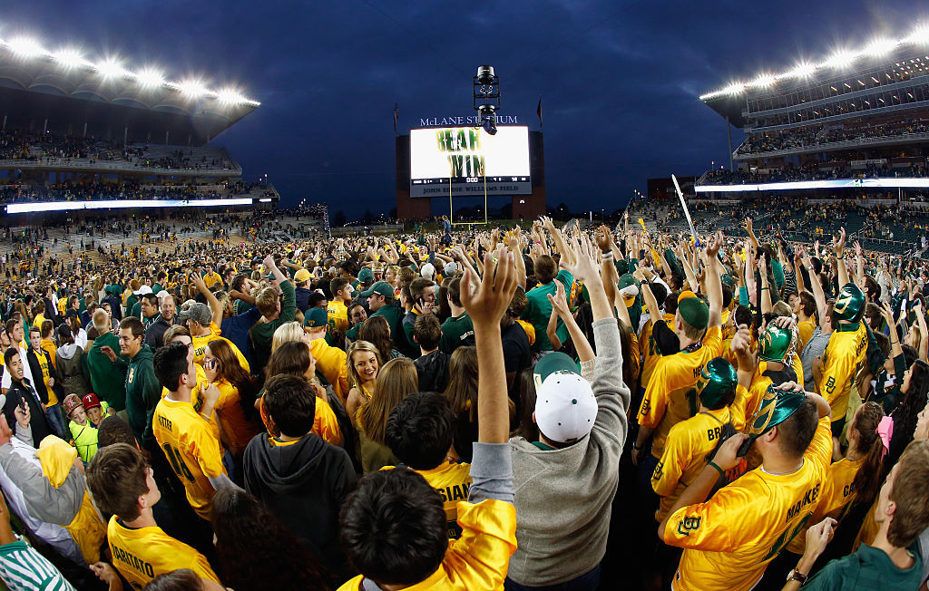 WACO, TX - OCTOBER 11: Fans rush the field after the Baylor Bears beat the TCU Horned Frogs 61-58 at McLane Stadium on October 11, 2014 in Waco, Texas. (Photo by Tom Pennington/Getty Images)