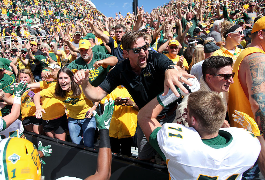 IOWA CITY, IOWA- SEPTEMBER 17: Fans celebrate with cornerback Darren Kelley #11 of the North Dakota State Bisons after the upset over the Iowa Hawkeyes on September 17, 2016 at Kinnick Stadium in Iowa City, Iowa. (Photo by Matthew Holst/Getty Images)