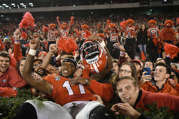 ATHENS, GA - NOVEMBER 12:  Davin Bellamy (17) Georgia Bulldogs linebacker celebrates with fans after the game between the Auburn Tigers and the Georgia Bulldogs on November 12, 2016, at Sanford Stadium at Athens, GA. Georgia defeated Auburn 13-7. (Photo by Jeffrey Vest/Icon Sportswire via Getty Images)