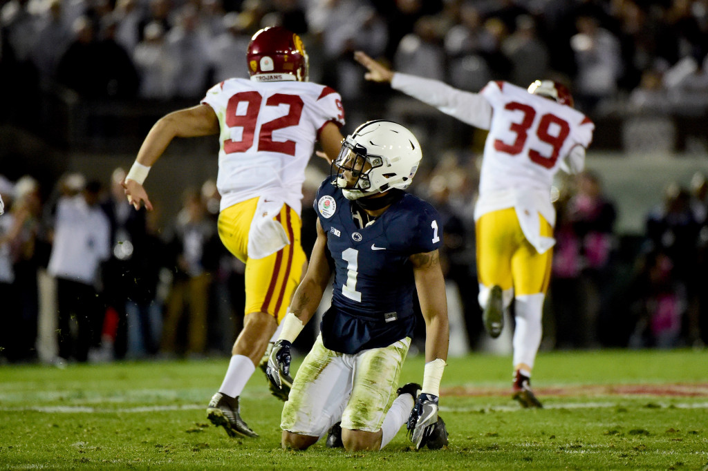 PASADENA, CA - JANUARY 02:  Cornerback Christian Campbell #1 of the Penn State Nittany Lions reacts as place kicker Matt Boermeester #39 of the USC Trojans (R) celebrates after making the game-winning 46-yard field goal in the fourth quarter to defeat the Penn State Nittany Lions 52-49 in the 2017 Rose Bowl Game presented by Northwestern Mutual at the Rose Bowl on January 2, 2017 in Pasadena, California.  (Photo by Harry How/Getty Images)