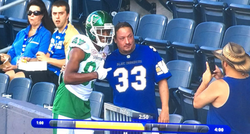 Duron Carter took a photo with an opposing fan Saturday.
