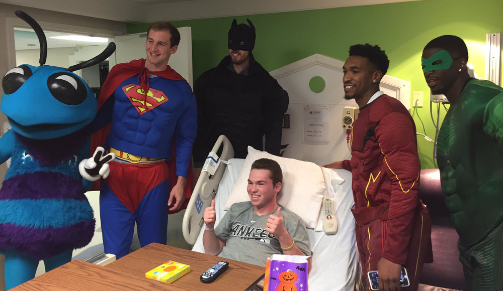 Charlotte Hornets players dressed as superheroes for a visit to a children's hospital.