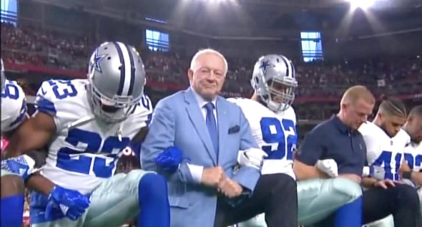 Jerry Jones knelt with his team ahead of the national anthem against Arizona.