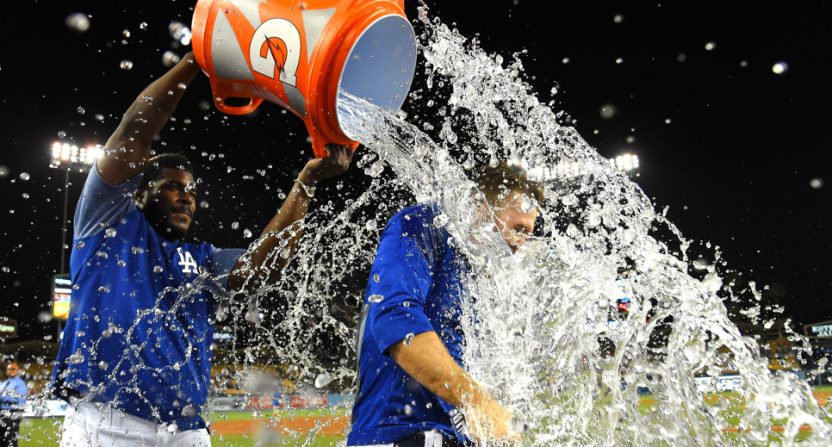 Brian Dozier getting a celebratory shower from Yasiel Puig.