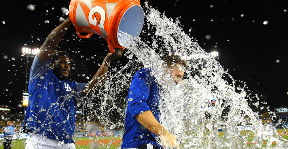 Brian Dozier getting a celebratory shower from Yasiel Puig.