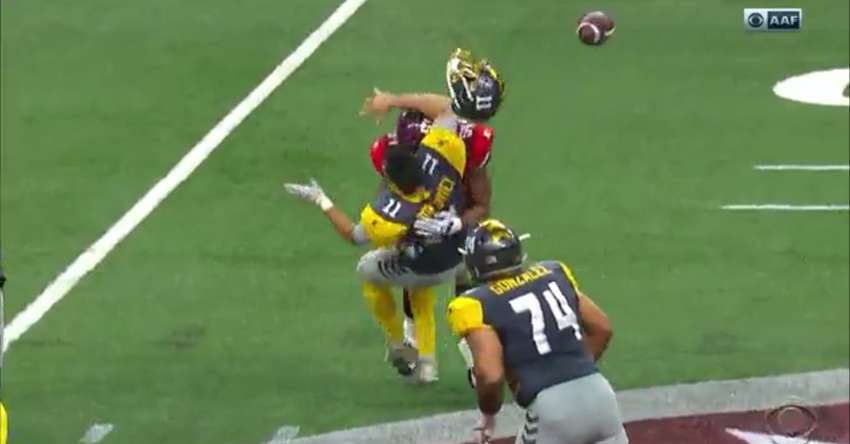 Mike Bercovici taking a hit in the first AAF game.