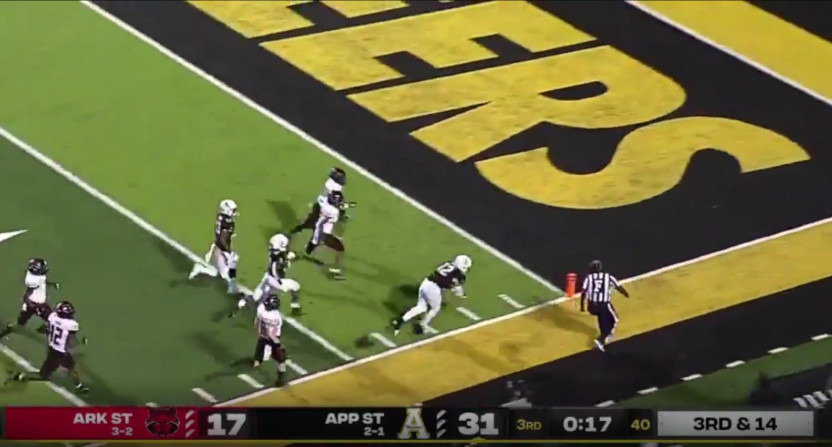 Zac Thomas diving for a touchdown for Appalachian State.