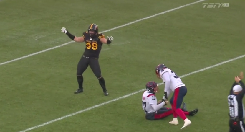 The Ticats' Dylan Wynn celebrating a sack and forced fumble.