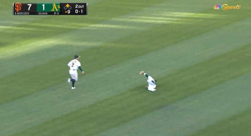 A's outfielder Ramon Laureano made a circus play in Saturday's game against the Giants, catching the ball after an unusual series of events.