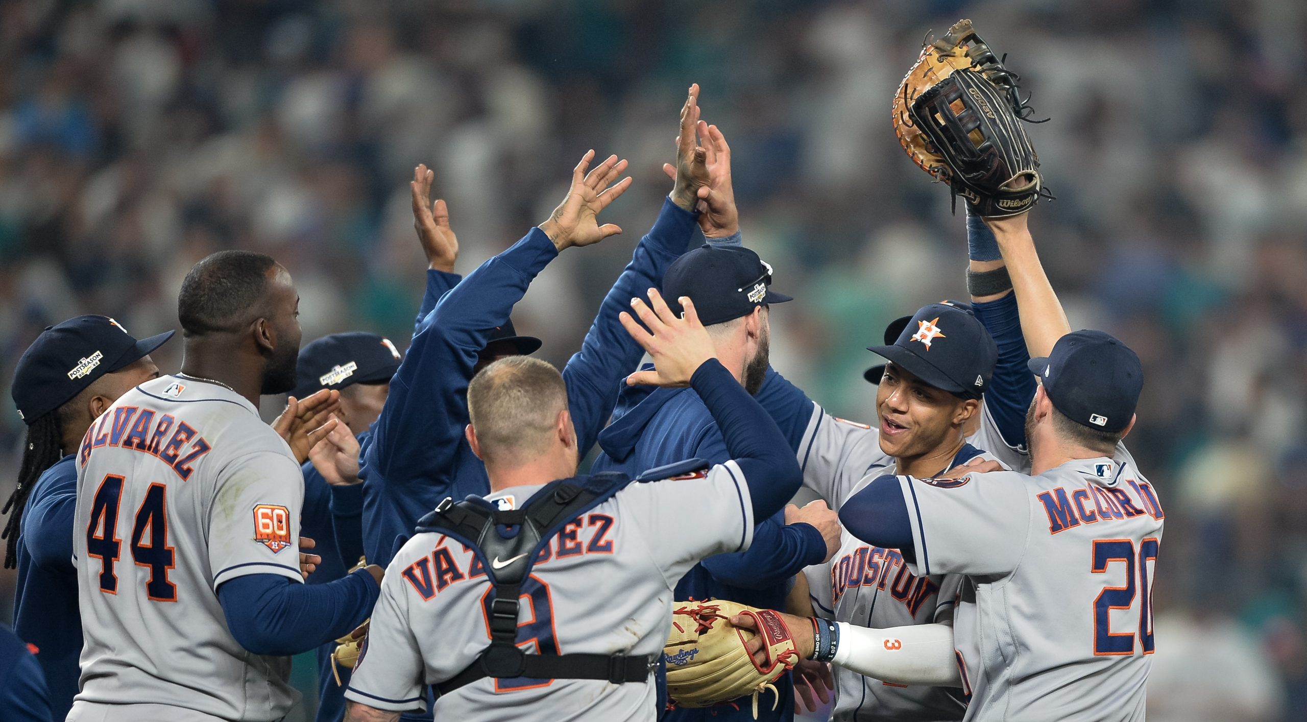 The Astros celebrate their win over the Mariners.