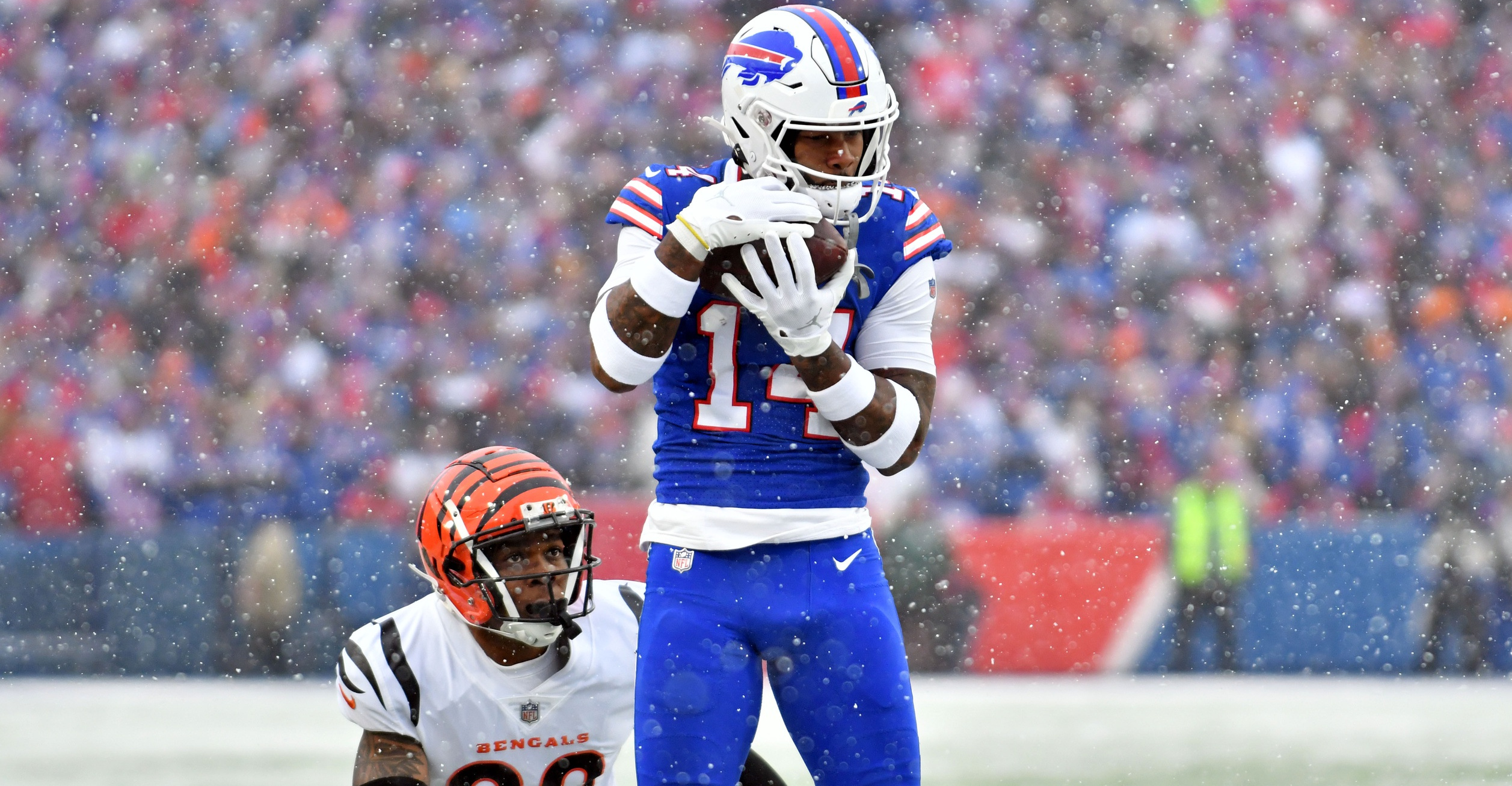 Stefon Diggs makes a catch for the Bills against the Bengals' Cam Taylor-Britt.