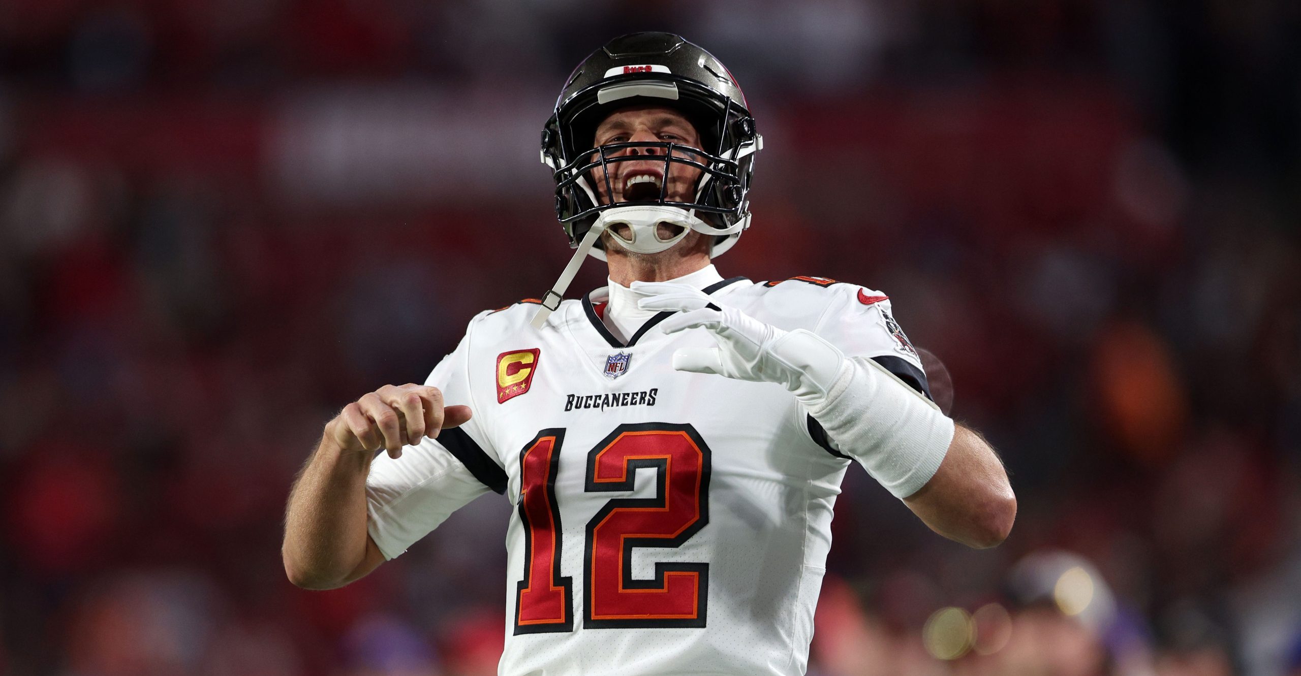 Jan 16, 2023; Tampa, Florida, USA; Tampa Bay Buccaneers quarterback Tom Brady (12) reacts before the wild card game against the Dallas Cowboys at Raymond James Stadium. Mandatory Credit: Nathan Ray Seebeck-USA TODAY Sports