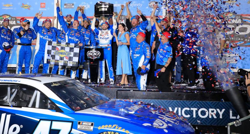 Ricky Stenhouse and his crew celebrate with the No. 47 Chevy Camaro after winning the 65th Daytona 500 on Sunday.