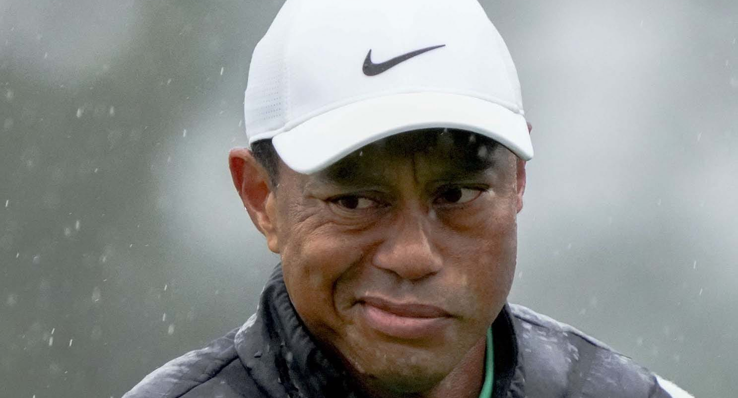 Tiger Woods in the rain at the 2023 Masters.