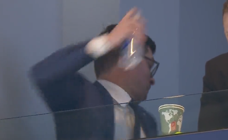 Toronto Maple Leafs general manager Kyle Dubas throws a water bottle in frustration.