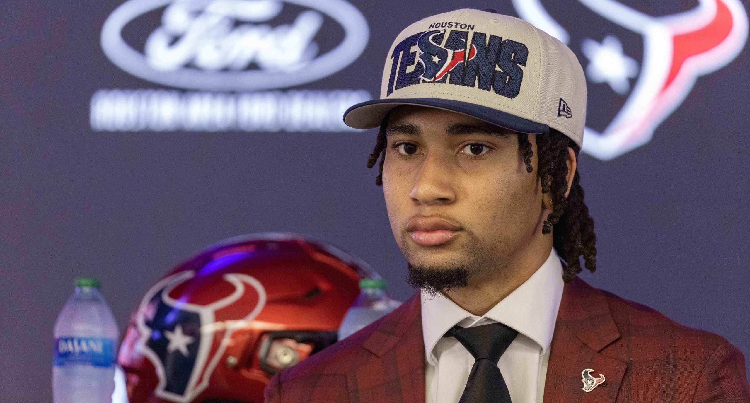 Apr 28, 2023; Houston, TX, USA; Houston Texans quarterback CJ Stroud, second overall pick in the 2023 NFL Draft, listens to a question at a press conference at NRG Stadium. Mandatory Credit: Thomas Shea-USA TODAY Sports