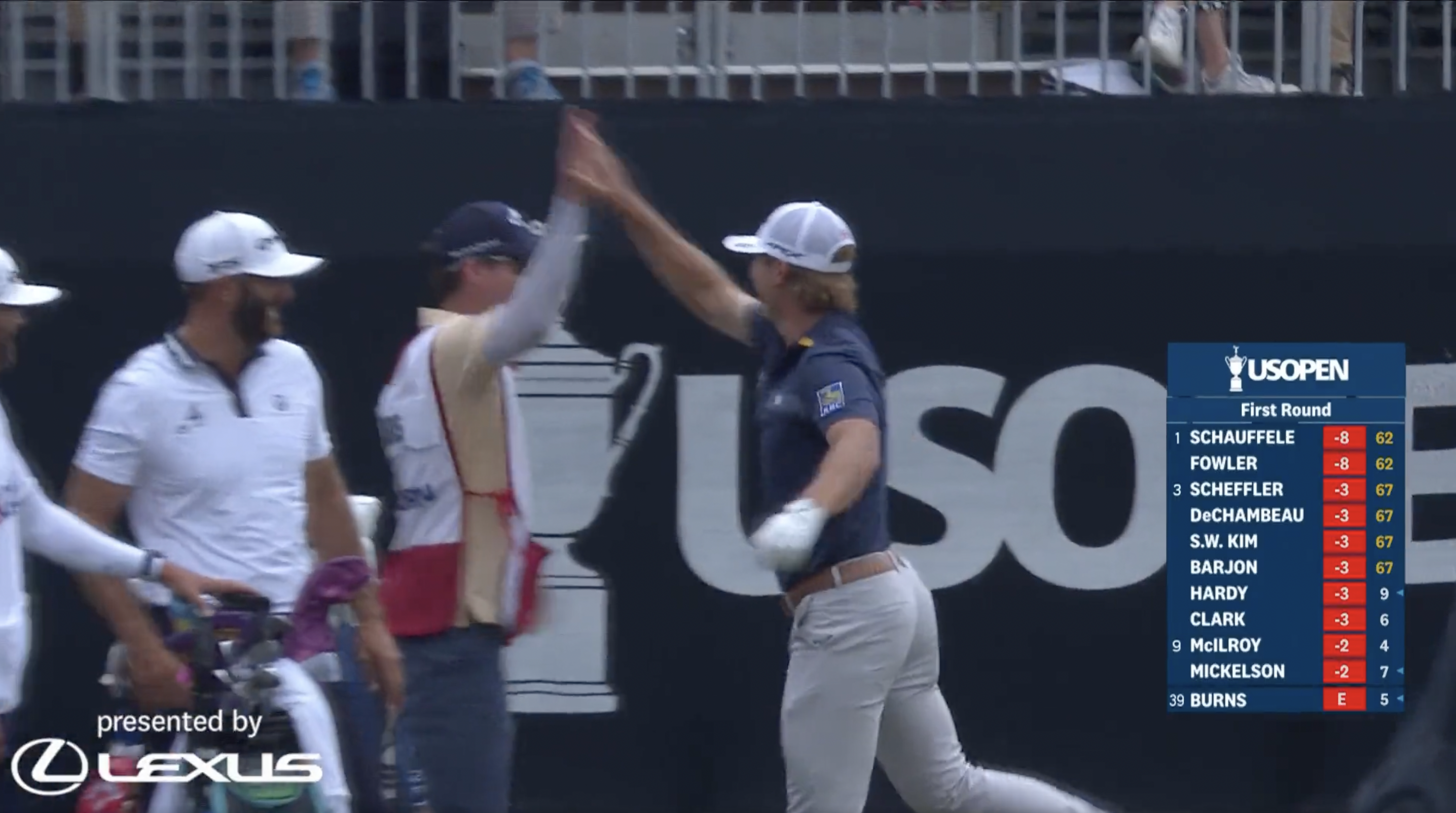 PGA Tour star Sam Burns high fives his caddie after recording a hole-in-one at the U.S. Open.