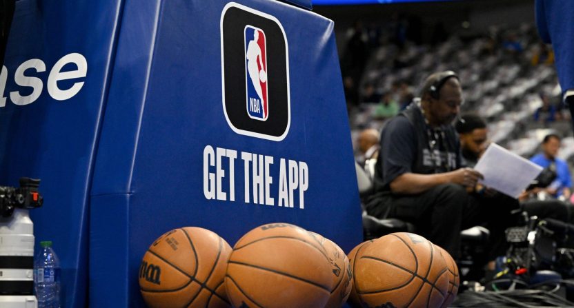Mar 5, 2023; Dallas, Texas, USA; A view of the NBA logo and NBA app logo and basketballs in front of the base during warms up before the game between the Dallas Mavericks and the Suns at the American Airlines Center.