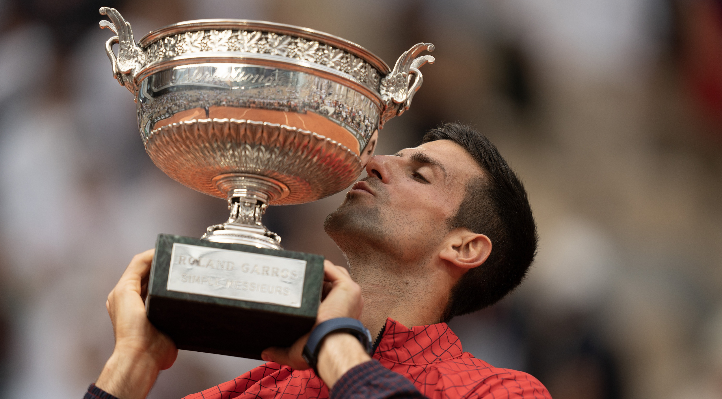 Novak Djokovic with the French Open trophy in 2023.