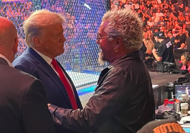 Guy Fieri chats with Donald Trump at UFC 290 in T-Mobile Arena in Las Vegas. [Photograph from Benny Johnson on Twitter]