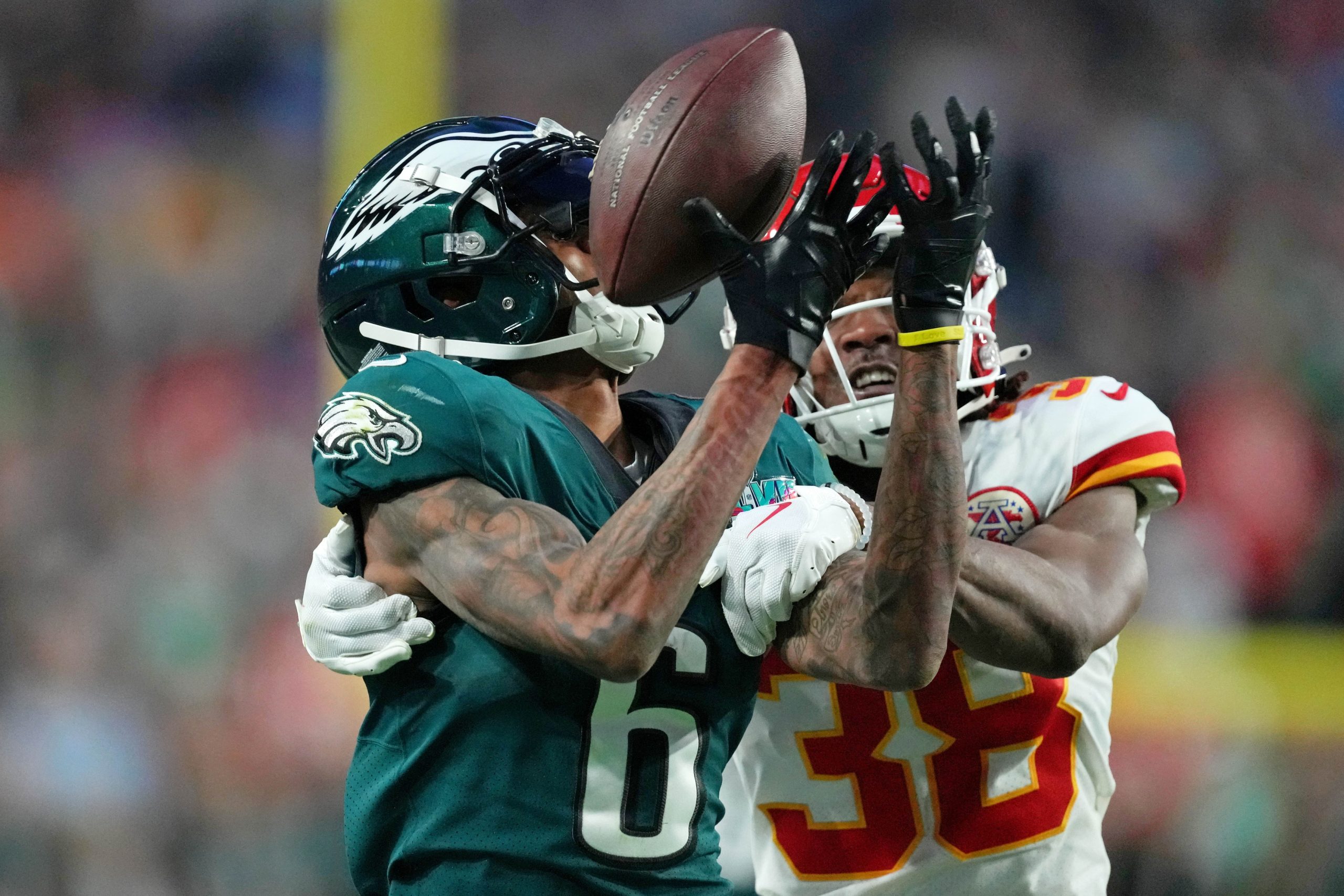 Feb 12, 2023; Glendale, Arizona, US; Philadelphia Eagles wide receiver DeVonta Smith (6) is unable to make a catch against Kansas City Chiefs cornerback L'Jarius Sneed (38) during the second quarter of Super Bowl LVII at State Farm Stadium. Mandatory Credit: Kirby Lee-USA TODAY Sports