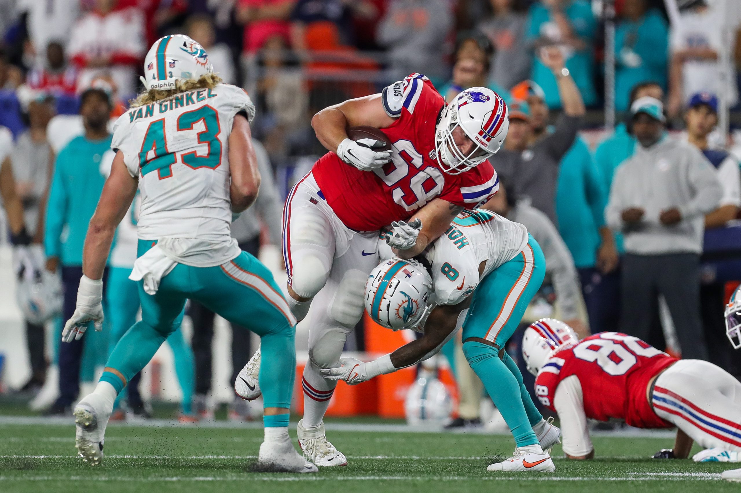 Patriots guard Cole Strange's efforts to keep his team's chances alive against the Dolphins on Sunday were great but fell just short. Photo Credit: Paul Rutherford-USA TODAY Sports