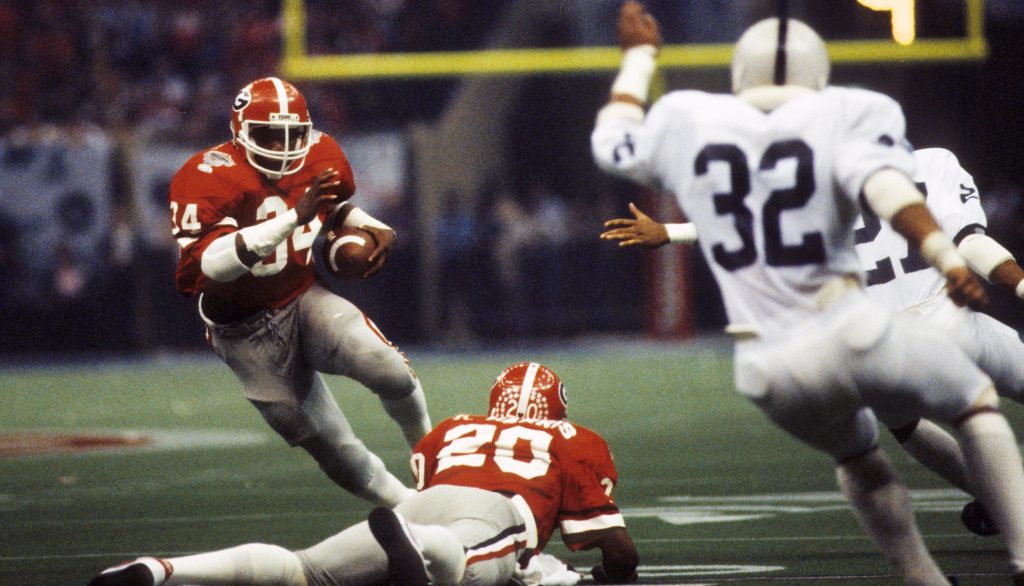 Georgia Bulldogs running back Herschel Walker (34) in action against the Penn State Nittany Lions during the 1983 Sugar Bowl. Penn State defeated Georgia 27-23 and won the national championship.