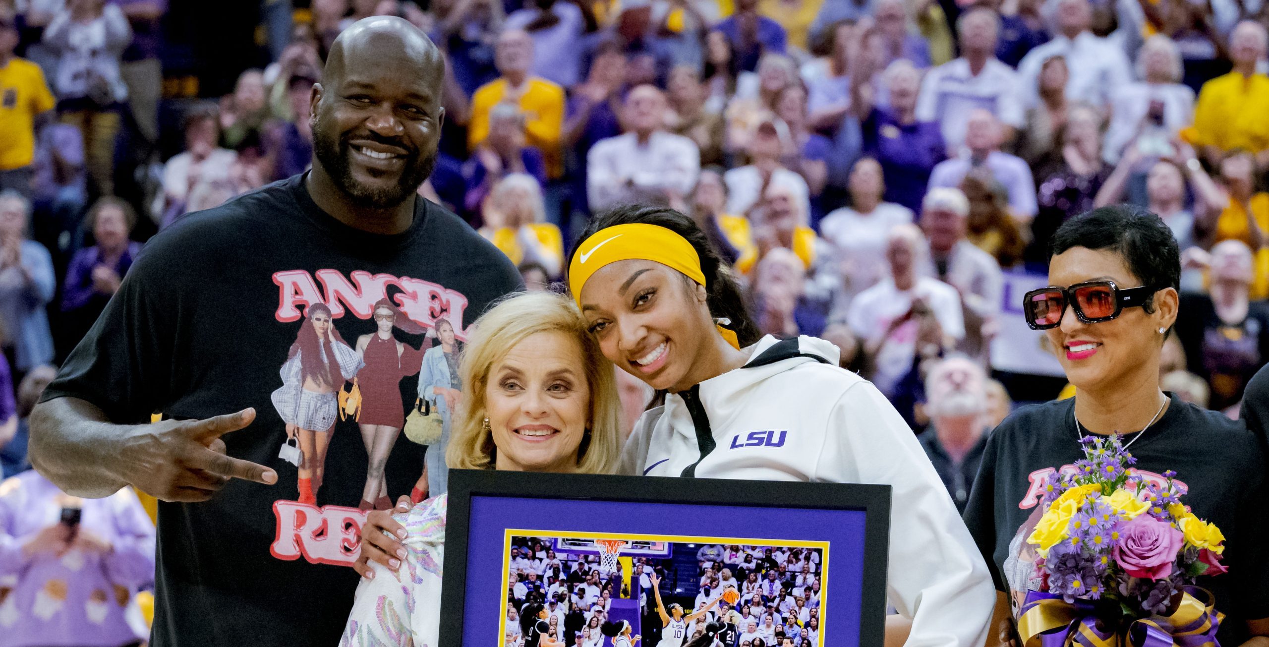 Shaquille O'Neal alongside Angel Reese and her family on her Senior Day