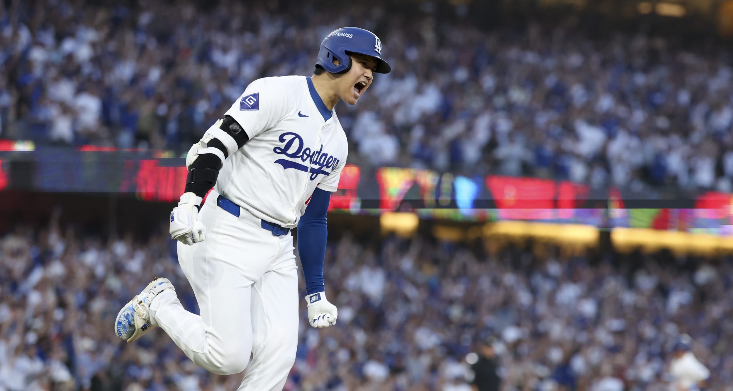 Oct 5, 2024; Los Angeles, California, USA; Los Angeles Dodgers designated hitter Shohei Ohtani (17) scores a home run against the San Diego Padres during game one of the NLDS for the 2024 MLB Playoffs at Dodger Stadium.