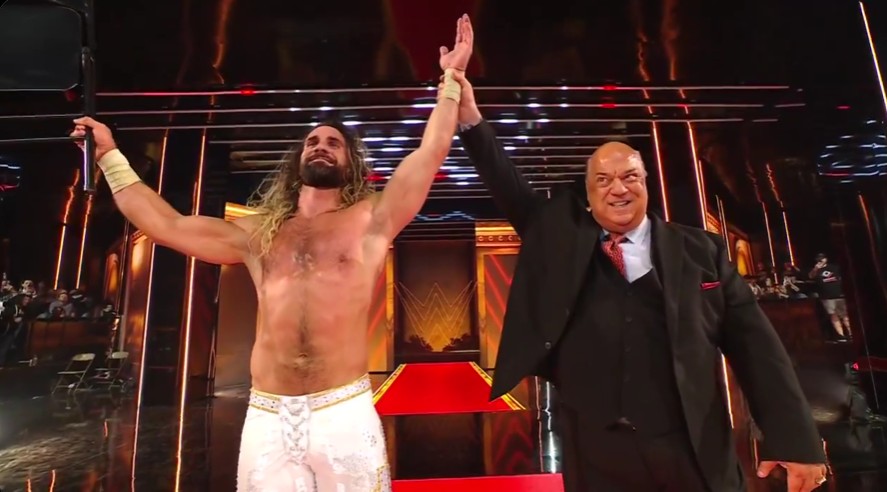 Paul Heyman, right, celebrates with Seth Rollins at the end of WrestleMania Night 1. Photo Credit: WWE/Peacock.