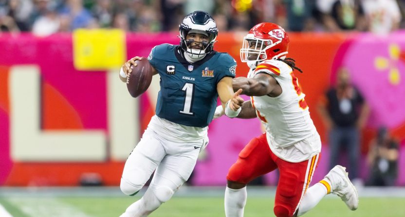 Philadelphia Eagles quarterback Jalen Hurts runs with the ball vs the Kansas City Chiefs in Super Bowl LIX.